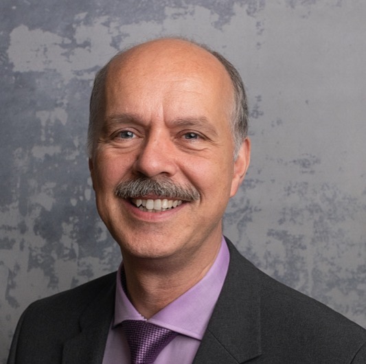 Dr. André Remy